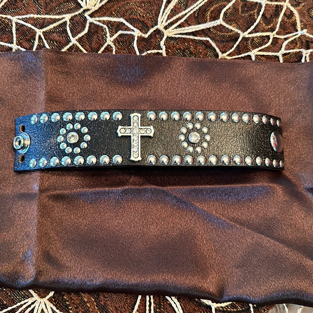 Black leather cuff.